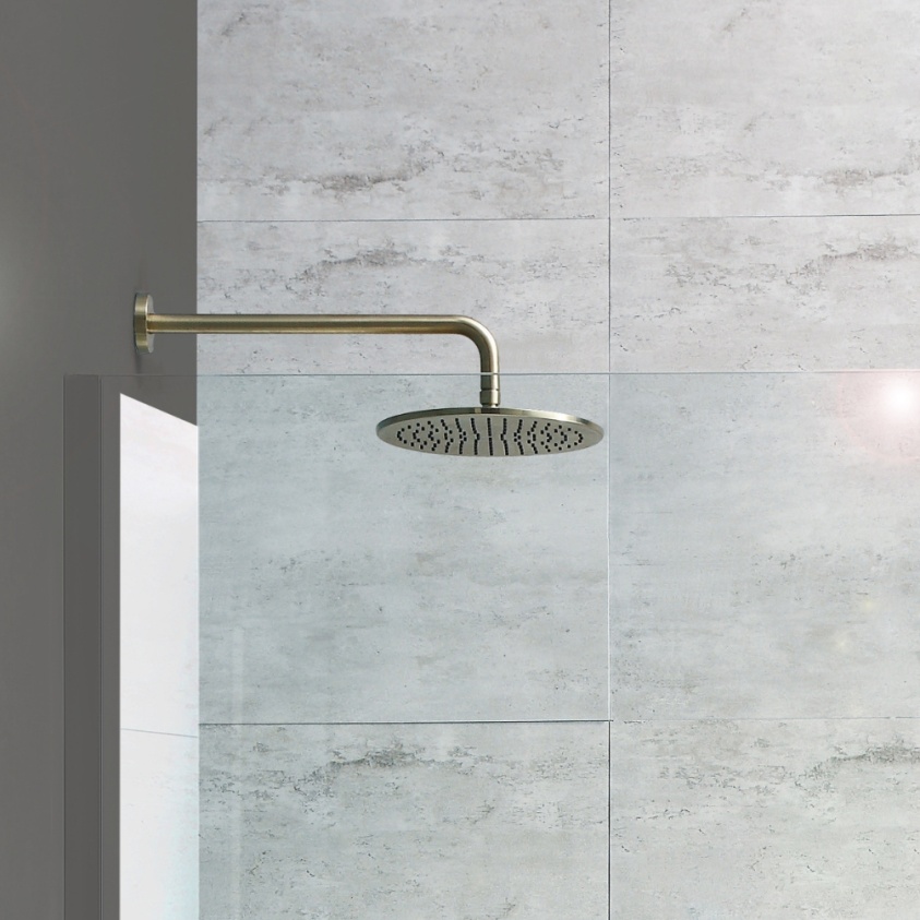 Close up product lifestyle image of the JTP Vos Brushed Brass 200mm Shower Head